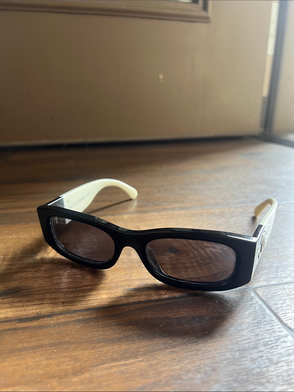 CHANEL Black Frame Sunglasses with White Temples